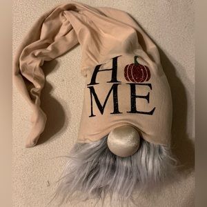 Fall gnome with pumpkin that says HOME